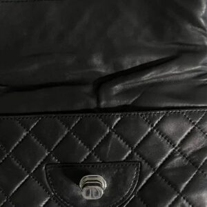 Black Calvin Klein quilted leather clutch bag with stunning silver hardware